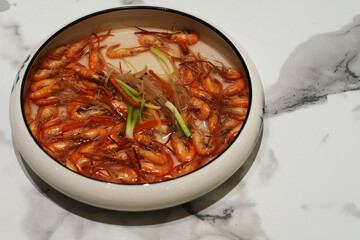 close up boiled shrimps with salt on table.Chinese cuisine