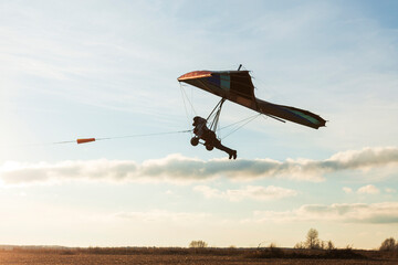 Fototapeta na wymiar Beginner hang glider wing silhouette