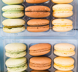 Brightly coloured Macaroons on sale at a food festival.