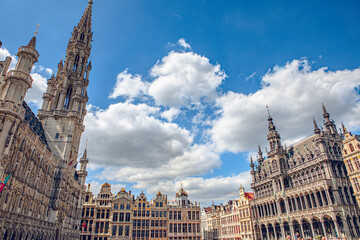 Brussels, Belgium - July 20, 2020: Tower of the city hall at the Grand place central square in the old town of Brussels