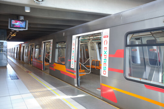 A train inside a subway station of Metro de Santiago.