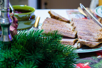 Cut Pieces Of Baked Meat On The Table.