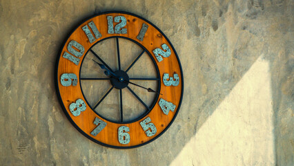 Clock on the concrete wall