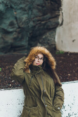 A girl with glasses posing