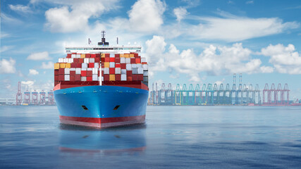 Front view from bow of a large blue shipping container ship with port harbour and container...