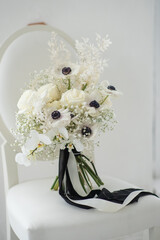 Beautiful elegant bridal bouquet of white flowers