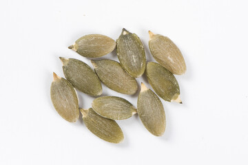 Dry pumpkin seeds isolated on white background