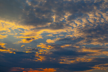 Colorful yellow clouds at blue sky