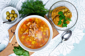 
Diet menu vegetable soup, vegetable caviar, olives. Vegan food concept. Lenten menu