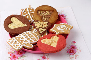 A plate of homemade cookies on a woven napkin close-up