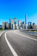 Fototapeta na wymiar Asphalt road and modern city commercial buildings in Beijing,China.