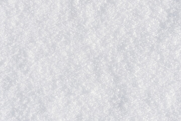 White clean shiny snow background texture. fresh snow  seamless texture. snowy surface closeup
