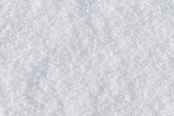 White clean shiny snow background texture. fresh snow  seamless texture. snowy surface closeup