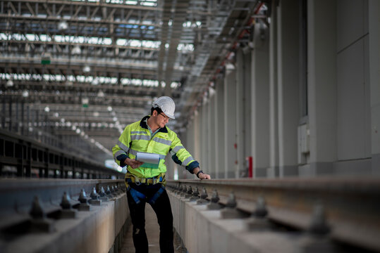 engineer standing on railway inspection. construction worker on railways. Engineer work on railway.rail,engineer,Infrastructure