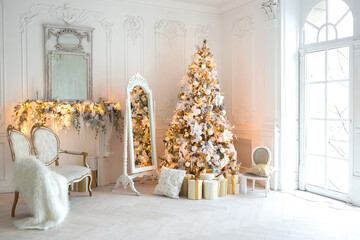 Fototapeta na wymiar luxurious expensive light interior living room in a royal style decorated with a very beautiful Christmas tree and large windows