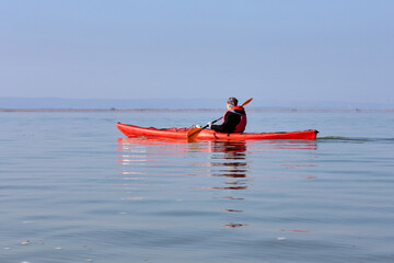 Kayak trip on the lake at winter season