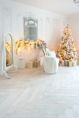 luxurious expensive light interior living room in a royal style decorated with a very beautiful Christmas tree and large windows