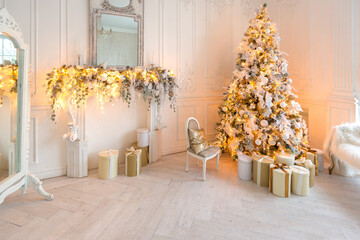 luxurious expensive light interior living room in a royal style decorated with a very beautiful Christmas tree and large windows