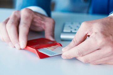 man insearting an electronic identification in a reader