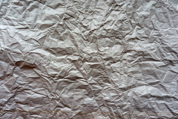 Abstract paper background. Crumpled pastel paper.