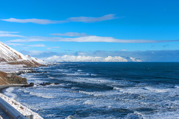 Beautiful winter view of picturesque Atlantic Ocean in Iceland. A waves of the Atlantic Ocean hit the coast of Iceland. The coast of Atlantic Ocean in winter.