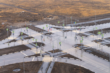 asphalt road junction unfinished on one side