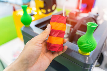 hand with vase closeup object printed 3d printer close-up. Progressive modern additive technology 4.0 industrial revolution