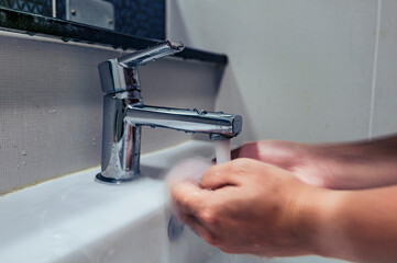 water tap and wash wet hand 