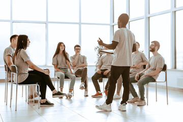 group of young people at a seminar in the conference room