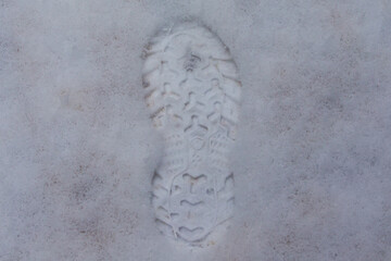 Fototapeta na wymiar Footprint in the snow after the storm Filomena passed through the capital. Extreme cold. Nevada in Madrid. Filomena storm.