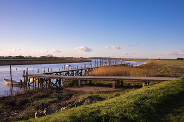 panoramic view over the marshland and the Lay river separating l'Aiguillon sur Mer and La faute sur Mer, Vendee France