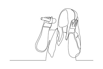 Continuous line drawing of young happy female pop singer holding microphone and singing on stage. Single one line art of musician artist performance concept design vector illustration