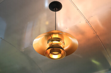 Vintage style electric lamps hanging on the ceiling