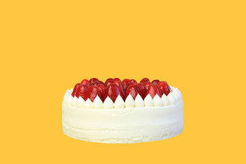 strawberry cake isolated on yellow background