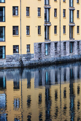 reflection of the house in canal water
