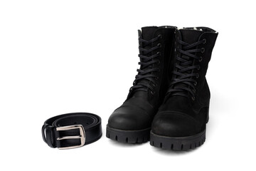 Black winter boots and leather belt isolated on white background.