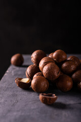 A pile of macadamia nuts on the table