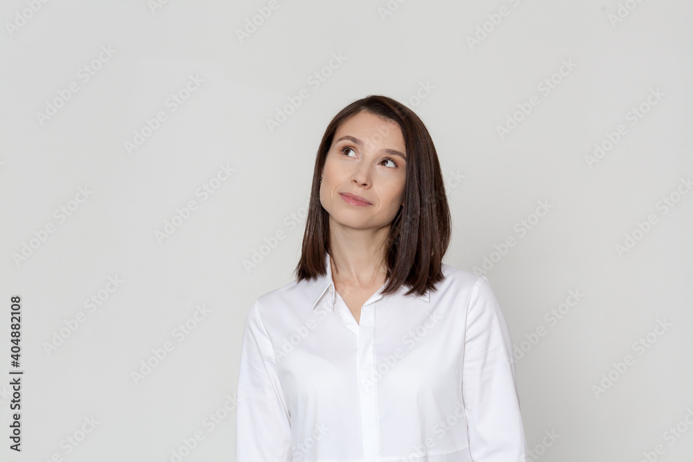 Wall mural business portrait of brunette woman on white background