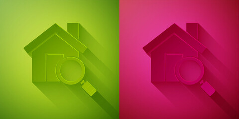 Paper cut Search house icon isolated on green and pink background. Real estate symbol of a house under magnifying glass. Paper art style. Vector Illustration.