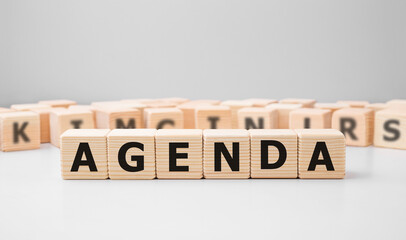 Word AGENDA made with wood building blocks