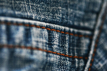 Jeans denim texture close up , focus only one point , soft blured background wallpaper