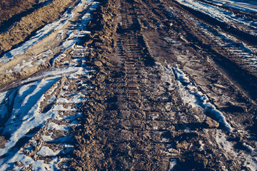 Dirty road in spring after snow