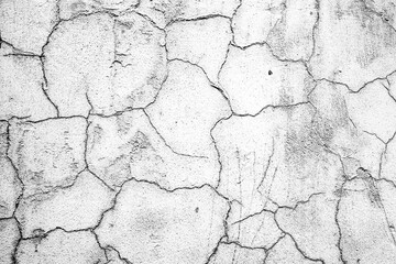 Texture of a concrete wall with cracks and scratches which can be used as a background