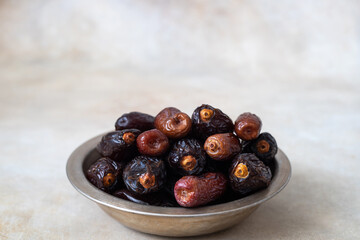 Juicy organic Medjool dates  on a background