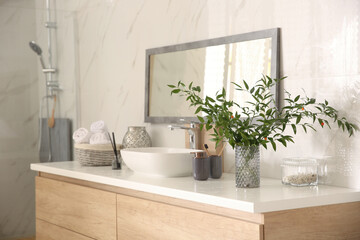 Naklejka na ściany i meble Modern bathroom interior with stylish mirror and vessel sink