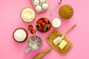 .Making strawberry pie for valentine's day. Products for the pie are flour, sugar, butter and strawberries.