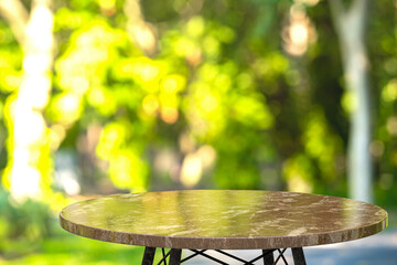 Empty marble table for display of products in front of restaurant , abstract blur background,empty copy space for, posters