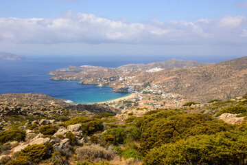 Naklejka na ściany i meble West coast of Ios and Mylopotas Bay with its popular beach. Cyclades, Greece