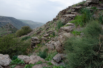 landscapes with mountain views with the remains of ancient buildings on the Golan heights in israel