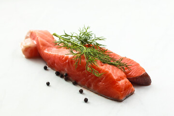 Composition with fresh salmon  on light background
